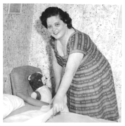 Gladys making up Elvis' bed